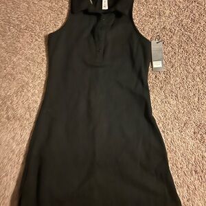Tennis dress. Women’s medium. Runs small. Brand new.